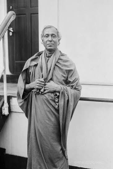 Anagarika Dharmapala standing in monastic robes